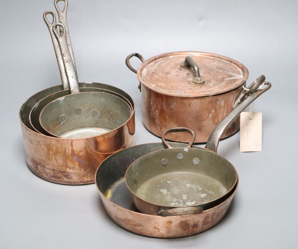 Three copper saucepans and three other copper cooking utensils